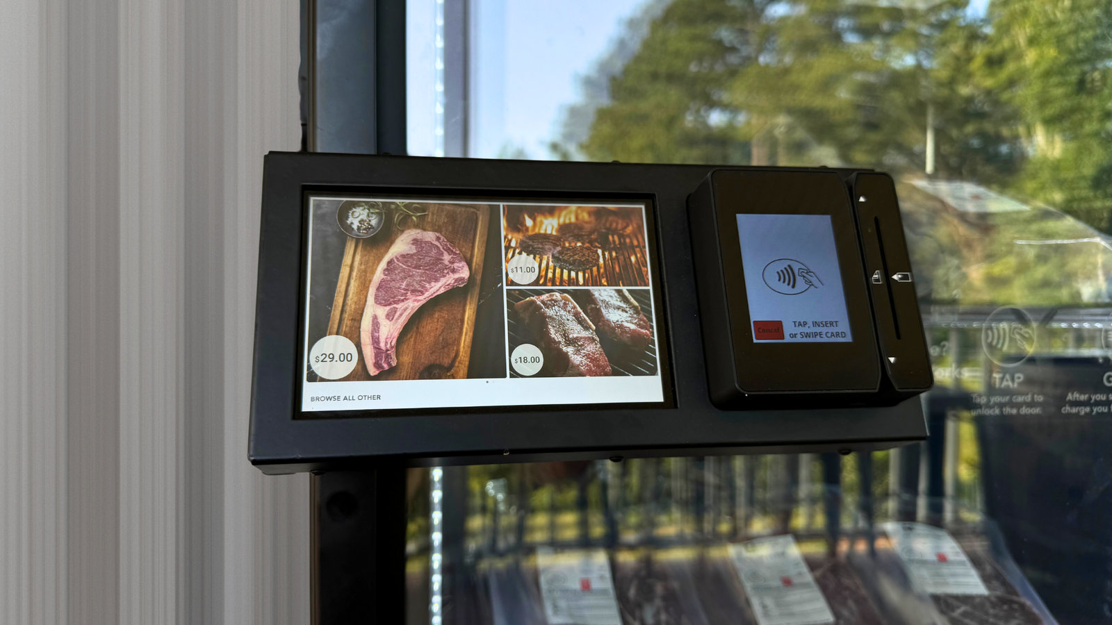 The vending kiosk's card reader and screen